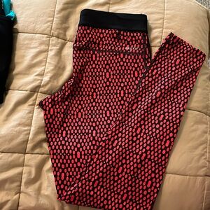 Black and red Nike dry fit running leggings